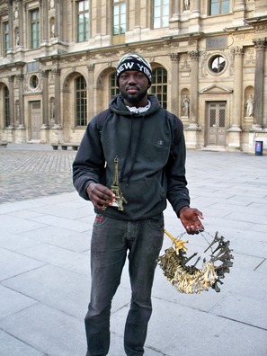 Прадавец сувеніраў у Парыжы Прадавец сувеніраў у Парыжы