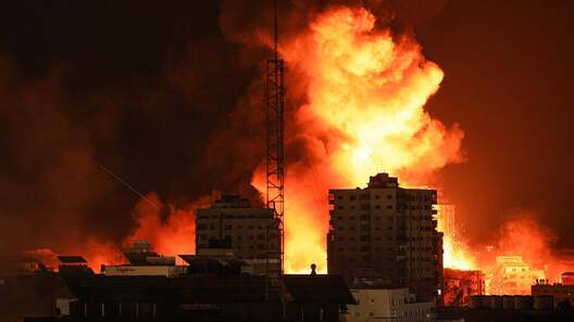 Газа ў агні. Фота: AFP Газа ў агні. Фота: AFP